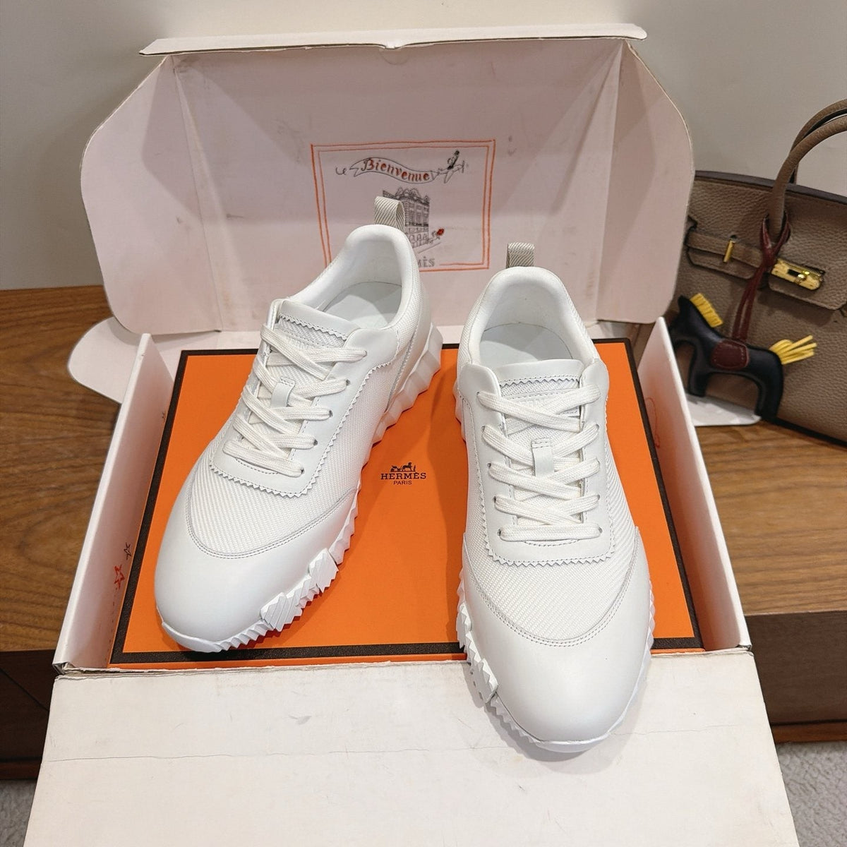 Hermès White Textured Low-Top Sneakers — front